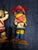 Two mid-century vintage Hopi-style Katsina (Kachina) dolls, paper-mache/canvas with what appears to be a grosso overlay...