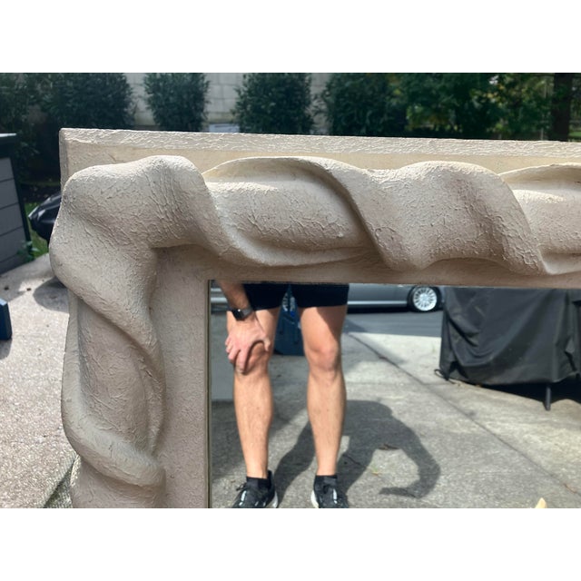 A beautiful and wonderfully well made plaster wall mirror of midcentury design. A heavy rope twist motif, and in excellent...