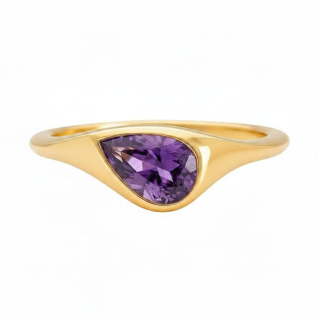 Pear Amethyst East-West Ring. Amethyst Solitaire Ring. Metal: 14k yellow gold Weight: 2.2 g, depends on size. Main stone:...