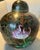 An exquisite extra-large ginger jar of traditional Chinese cloisonné craftsmanship. On its dark brown enamel vibrant...