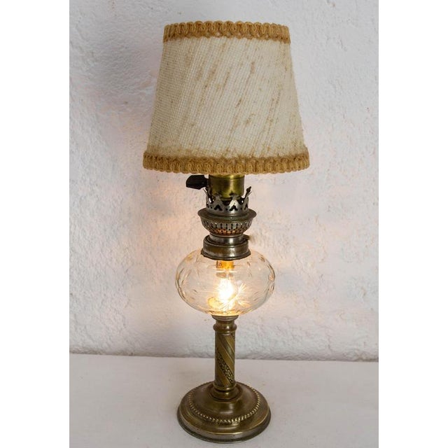 Antique kerosene lamp later converted to electricity. Napoléon iii period, bronze and glass as the kerosene tank was of...