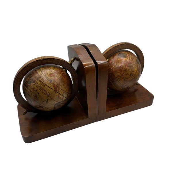 These unique acacia wood bookends have a functional old world globe and would add a fun midcentury touch to any library....