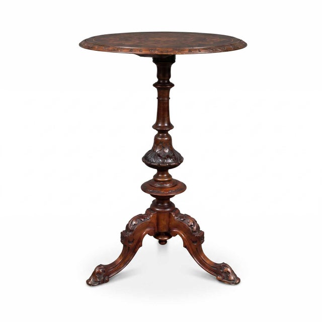 Round Walnut Burl Coffee Table with Inlay of Saint George and the Dragon, a piece of furniture distinguished by its...