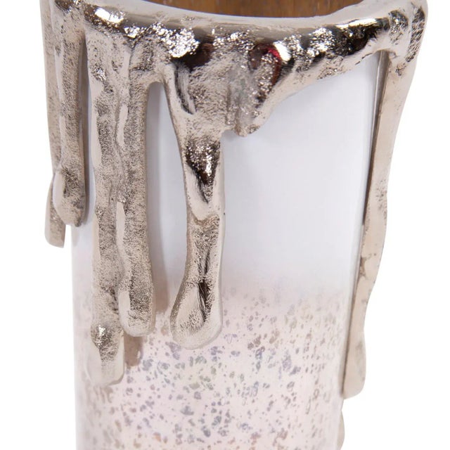 The Arctic Glacier Glass Tall Pillar Holder The Artic Glacier candle holder showcases the beauty of fire and ice. The icy...