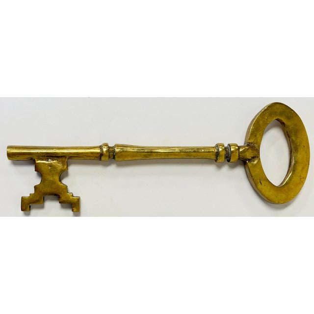 Vintage oversized solid brass skeleton key. Ideal decorative accessory or paper weight. Top some large books on a coffee...