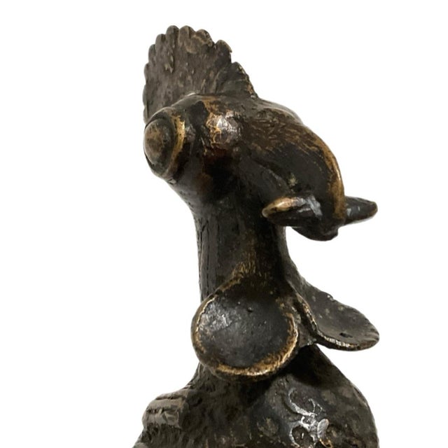 Benin Bronze Rooster This item is a bronze rooster sculpture in the style of traditional Benin bronzes from Nigeria. These...