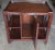 A late 20th Century Mahogany Rolling Side Cabinet in great vintage condition. Measures 27" in width, 18" in depth and...