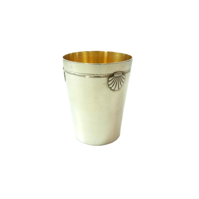 A fine French silver timbale in a classic style embellished with Coquilles or shells around the top of the cup. The...