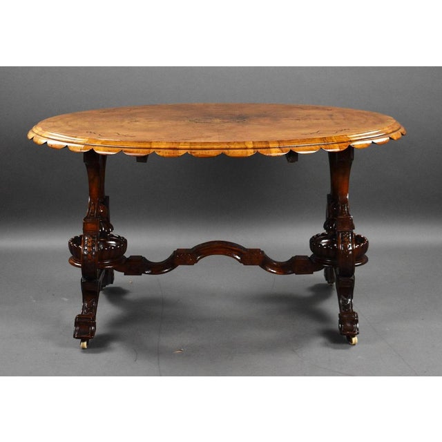 For sale is a top quality Victorian burr walnut inlaid centre table, the well figured top strung and beautifully inlaid...