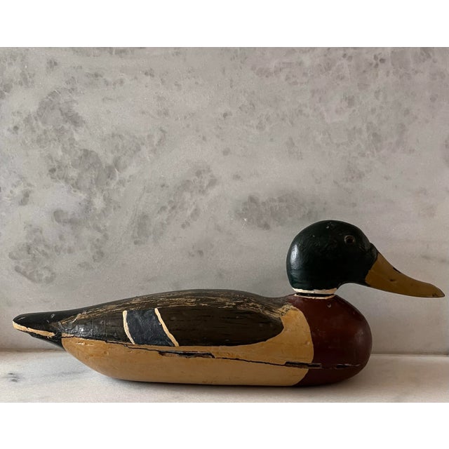 Vintage hand carved and painted wooden duck decoy. Signed on the bottom "To Joleine From Grandma & Grandpa Kinsey Xmas 1969"