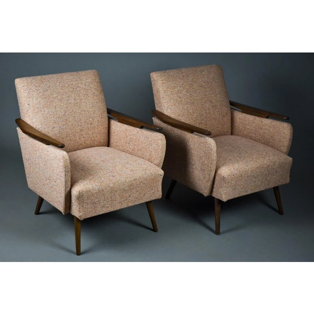 These armchairs were created in the 1950s and underwent a thorough renovation in our workshop. The wooden elements were...