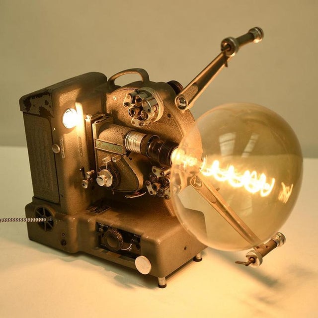This old Heurtier projector, initially designed for film projection, has been skillfully transformed into a unique and...