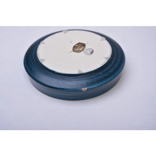 This ceramic bowl from Knabstrup is a mid century modern beauty. It features three stylized leaf shapes made from sweeping...