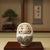 This finely executed Japanese Daruma netsuke is a true functional miniature, measuring approximately 1 inch in height and...