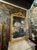 The product is a 19th century French Louis Philippe mirror featuring a crest and Greek key pattern. This stylish mirror...