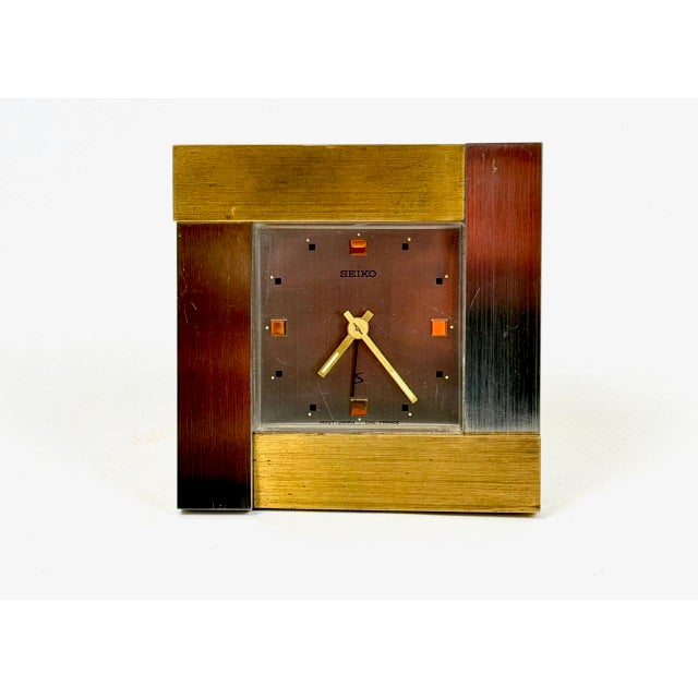 French Brutalist Steel and Brass Table Clock from Seiko, Japan, 1980s, in Very Good conditions. Designed 1980 to 1989 This...