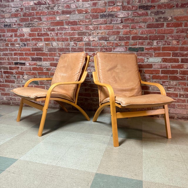 Vintage mid-century Danish modern leather and bentwood beech armchairs manufactured by Stouby Polster Møbelfabrik,...