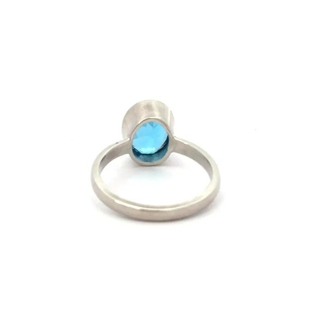 Blue 9x7 Mm Oval Cut Blue Topaz Silver Solitaire Ring by Carat&her - Size 7.5 For Sale - Image 8 of 12