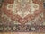 An early 20th-century square shape Persian heriz rug. The medallion is off-centered which looked to be intentionally done...