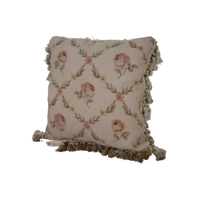 20th century square needlepoint throw pillow, hand embroidered with a pattern of pink roses, divided by crisscrossing...