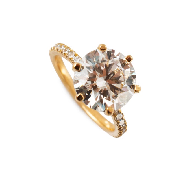 Gender: Ladies Metal Type: 18K Yellow Gold Ring Size: 6 Width: 1.90 mm Weight: 3.56 grams Ladies 18K yellow gold, lab-...