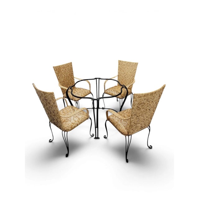 An elegant late-20th-century French Bistro / Palm Beach Regency casual dining suite, featuring four high-back armchairs in...