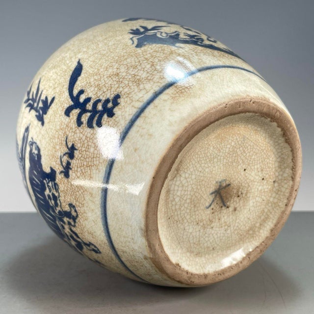 A beautiful and intricately detailed Chinese lidded jar featuring a classic underglaze blue and white narrative scene set...