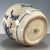 A beautiful and intricately detailed Chinese lidded jar featuring a classic underglaze blue and white narrative scene set...