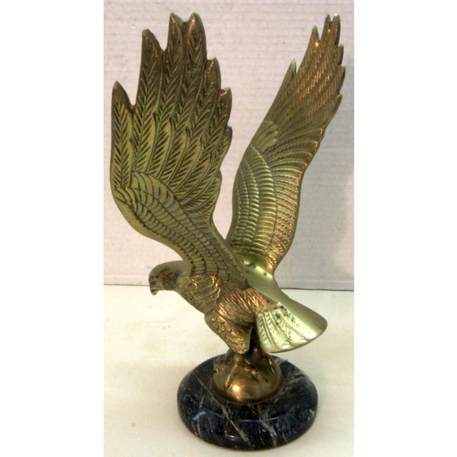 Sculpted at 10.5" and realistically cast at full-wingspan, this spectacular Mid-Century symbolic raptor embodies the most...