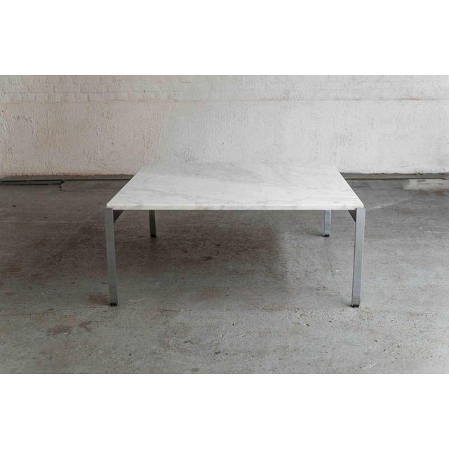 Very sleek carrera marble coffee table, designed by Chinese-Dutch designer Kho Liang Ie in the 1950’s and produced by...