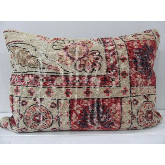 This is a pillow cover made from a vintage kilim rug. The piece was properly washed and ready to use. Pillow inserts not...