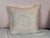 This elegant pillow showcases exquisite Fortuny textile craftsmanship. The front features a soft blush-toned background...