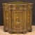 Large Venetian corner cabinet from the first half of the 20th century. Finely carved, lacquered, and hand-painted wooden...