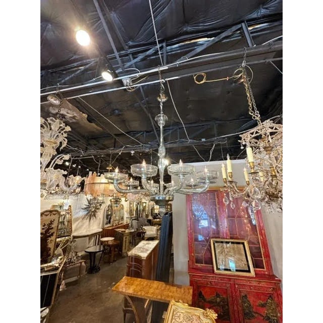 Lovely modern steel blue Murano glass chandelier. A glistening beauty that makes an elegant statement!