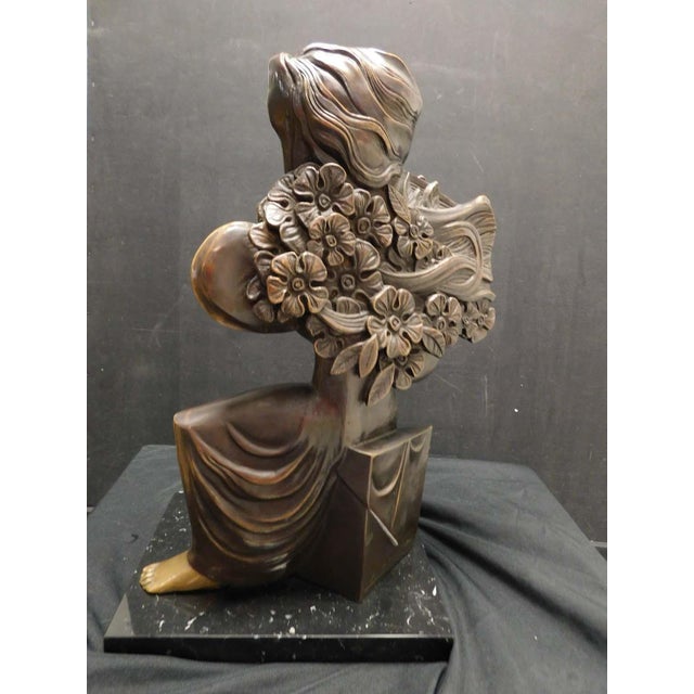 "Mujer Sentada" Bronze Sculpture by Sunol Alvar Hand signed by the artist Base Size: 9" x 6" x 3" High: 19" Edition...