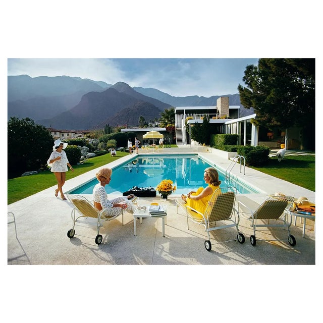 Slim Aarons, Catch Up by the Pool, Estate Stamped Photographic Print, 1970 / 2020s For Sale