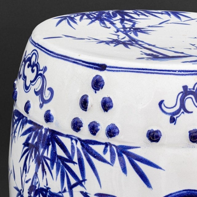 Pair of Thai Chinese Style Blue and White Glazed Ceramic Reticulated Cylindrical Garden Stools, with hand-painted bamboo...