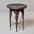 This early 20th century French garden or side table is made of iron and metal with a black finish. This table is meant for...