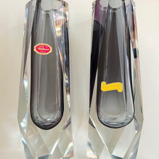 This is a beautiful pair of vintage Murano glass vases that both still retain their original labels. They are similar but...
