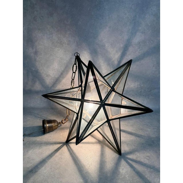An exceptional and iconic early 20th-century "Moravian Star" pendant light, hand-crafted during the interwar period (circa...