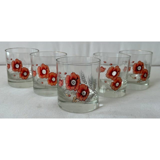 Pretty in pink! This set of 5 ball glasses feature pink floral artwork with touches of gold on molded glass. Enjoy a...