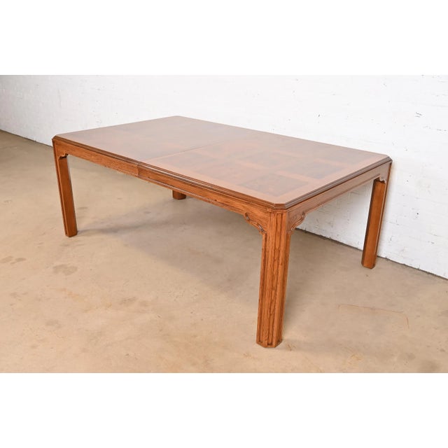 A magnificent and sprawling vintage mid-century dining table by the prestigious Drexel Heritage, masterfully combining...
