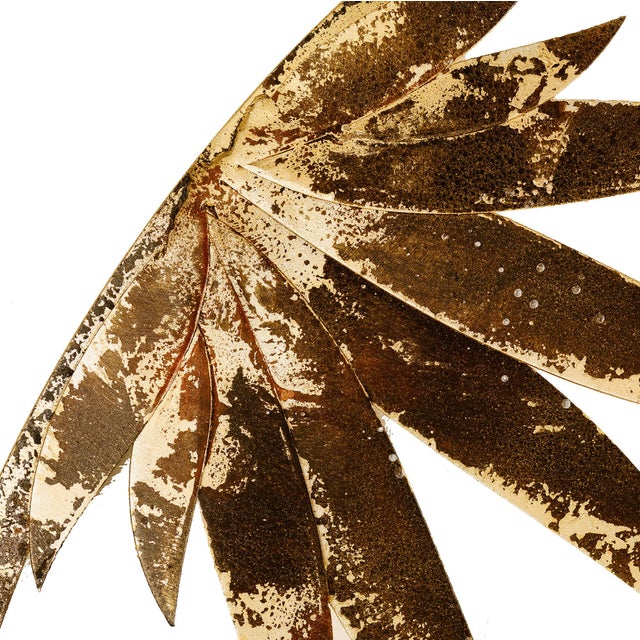Soft and organic leaves surround the round Agave Leaves Mirror to give movement and charm to this handcrafted piece. Care...