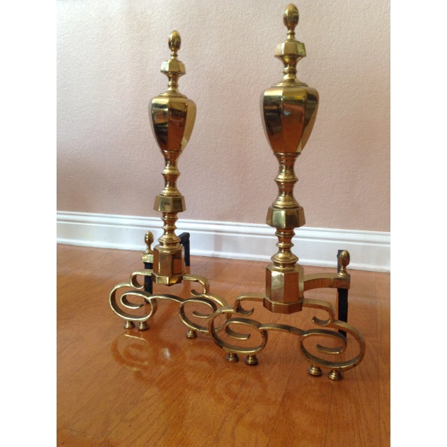 Antique solid brass and iron andirons from a stately city home. They are early 20th-century American-made andirons, and...