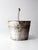 This vintage wooden bucket brings rustic charm with its naturally weathered gray paint and exposed wood tones. Built from...