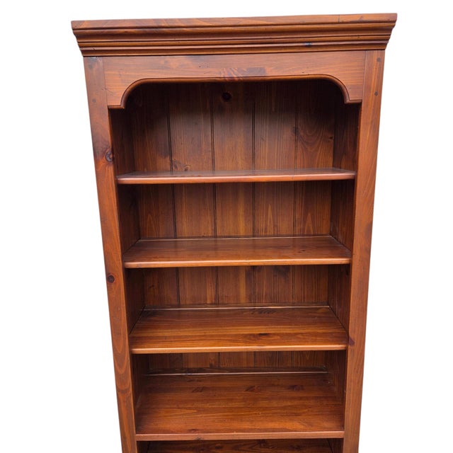3 adjustable shelves and 2 fixed shelves for a total of 5 shelves. Beautiful Ethan Allen cabinet in excellent condition...