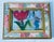 Mini abstract tulip painting- acrylic on brown paper in a colourful frame.