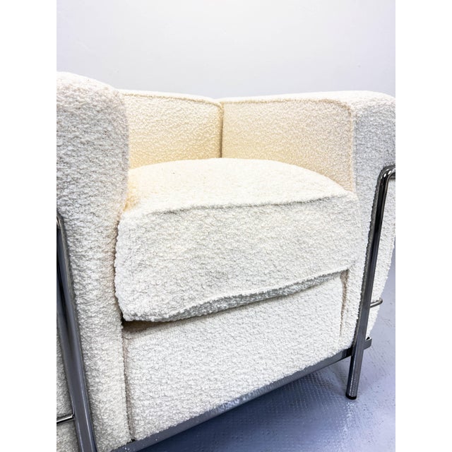 LC2 Chair in Bouclé by Le Corbusier and Charlotte Perriand for Cassina, in Flawless conditions. Designed 1920 to 1949 This...