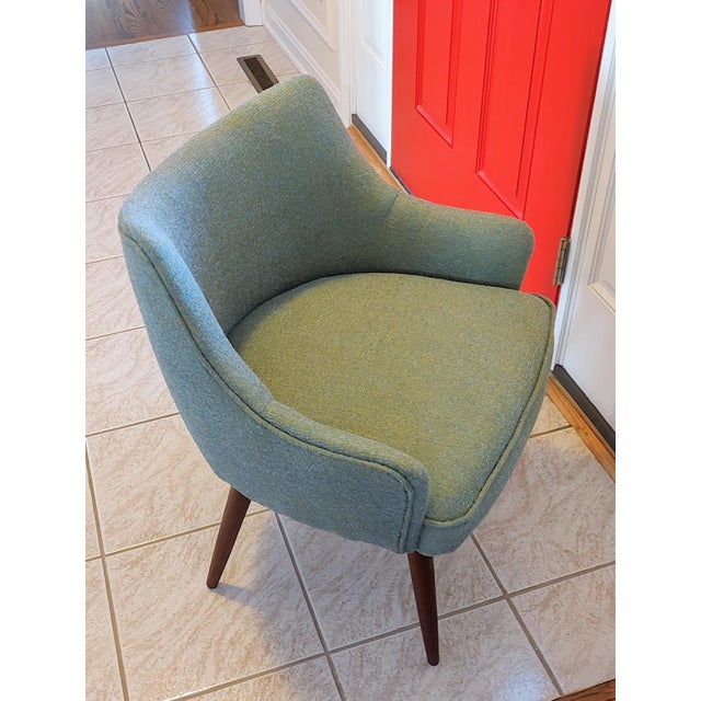 Lovely refurbished MCM tub chair. Upholstery fabric is durable and a green tweed with some gold tones. This chair will add...