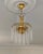 Antique brass chandelier with milk white glass rods, fully rewired and restored, offering elegant vintage lighting for...